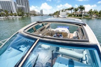 the back of a boat with a view of a city