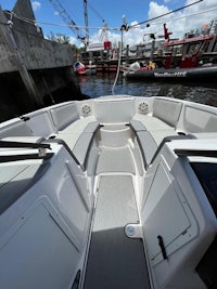 the back of a boat with a dock in the background
