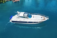 an aerial view of a boat in the water