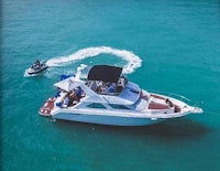 two people on a motor boat in the ocean