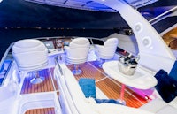 the interior of a luxury yacht at night