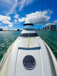 the back of a white boat in the water