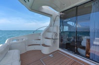 a white boat with a sliding door