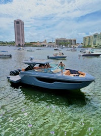 a group of people on a boat in the water