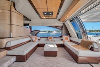 the interior of a luxury yacht with couches and a sofa